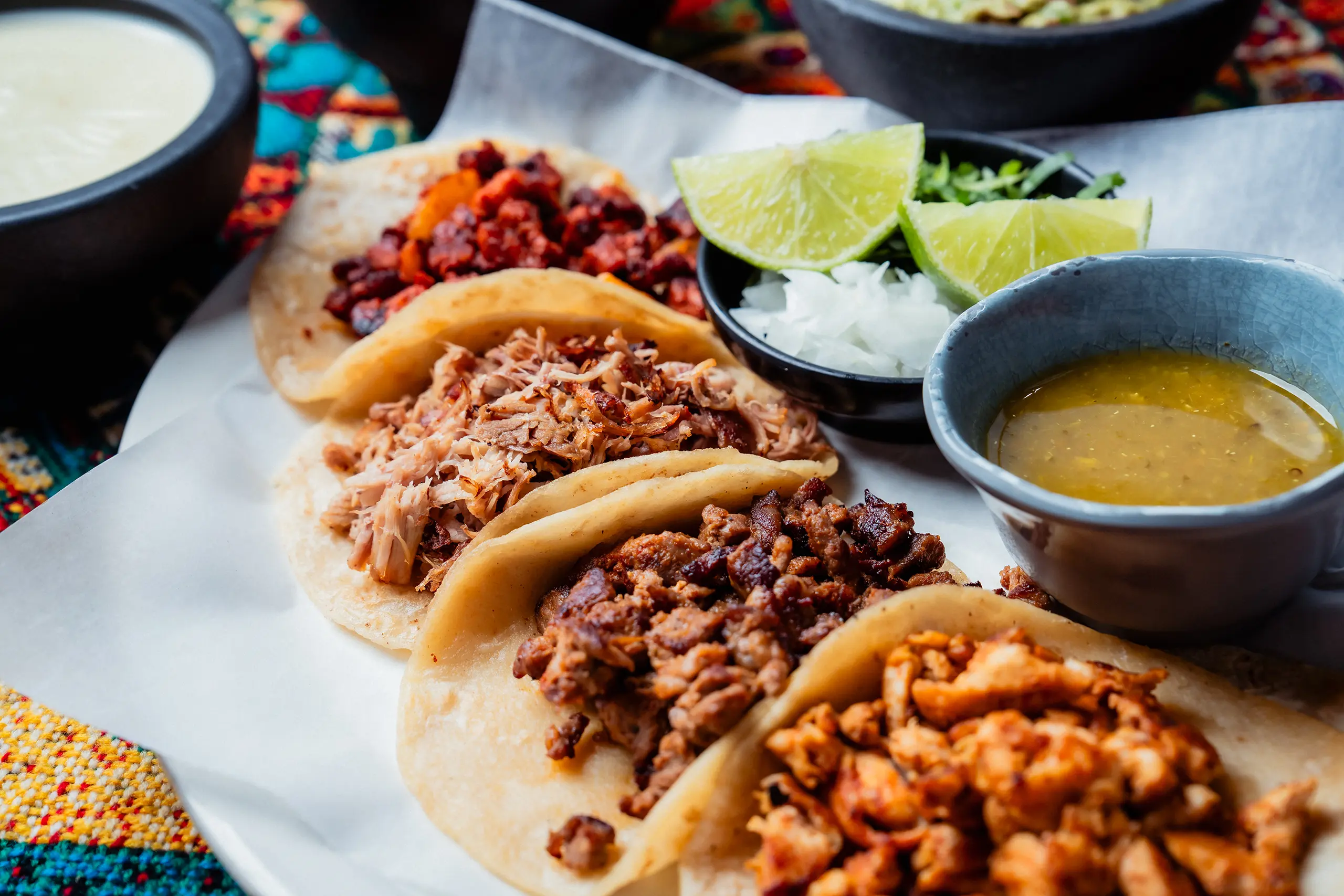 Mexican dishes spread across a table